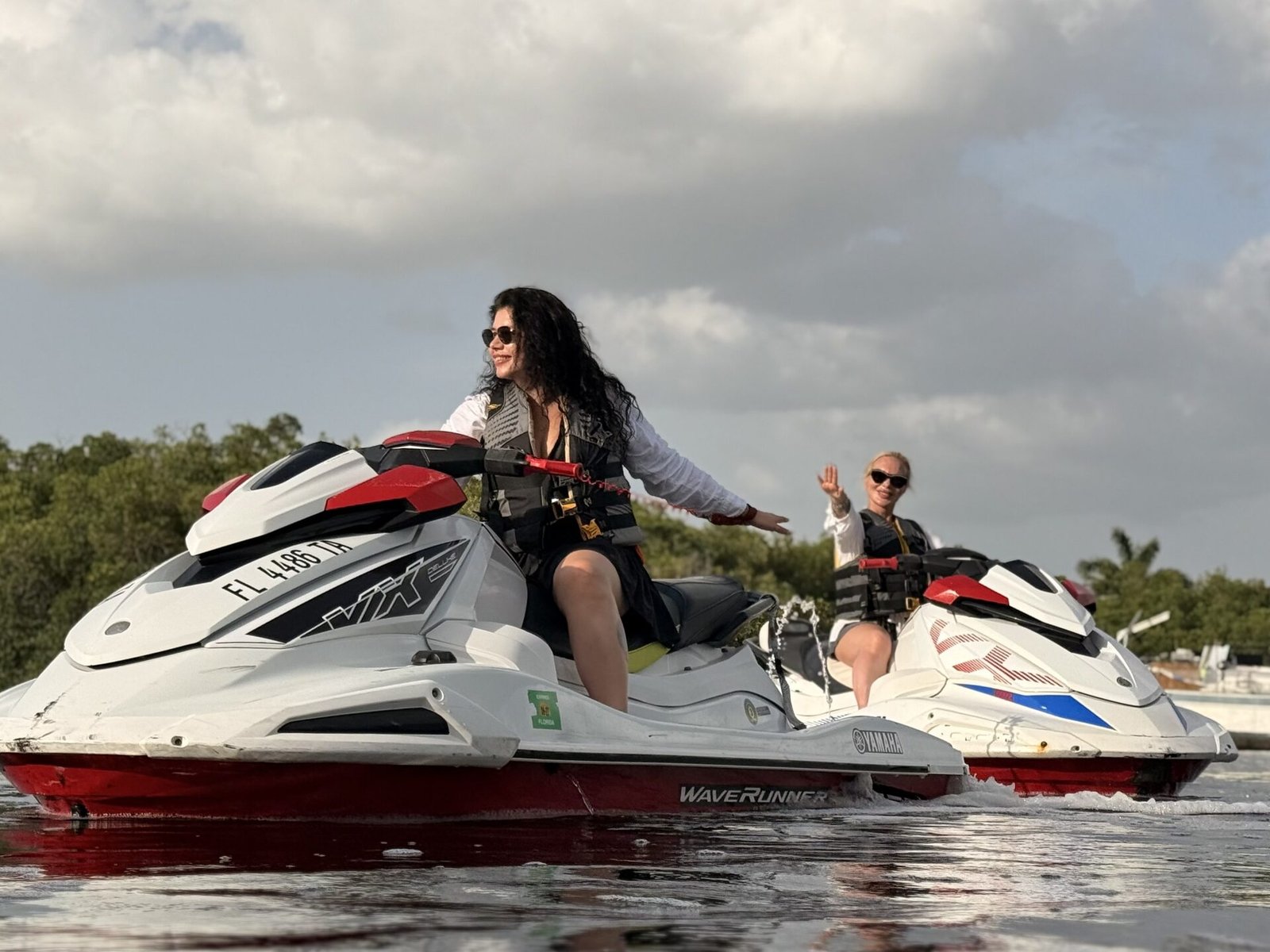 Riders having fun on jet ski rentals near Cape Coral